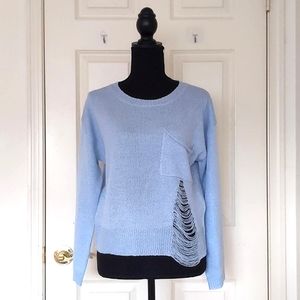NWOT. Cropped Length Dropped Shoulder Ripped Blue Sweater with pocket.